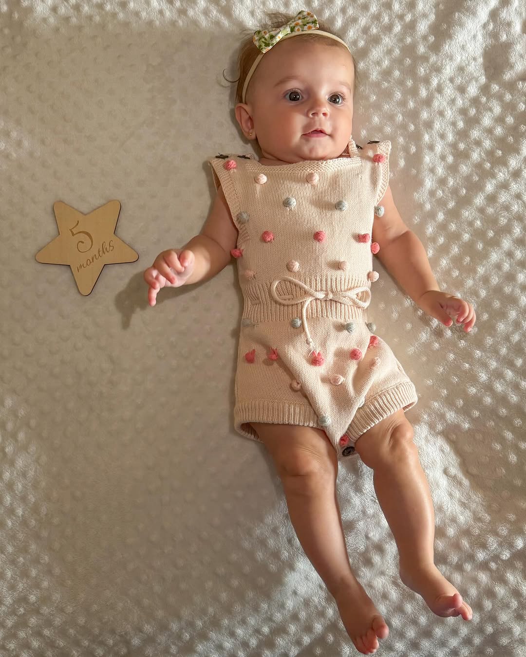 Gestrickter Baby-Romper ‚Eva‘ – Terrakotta