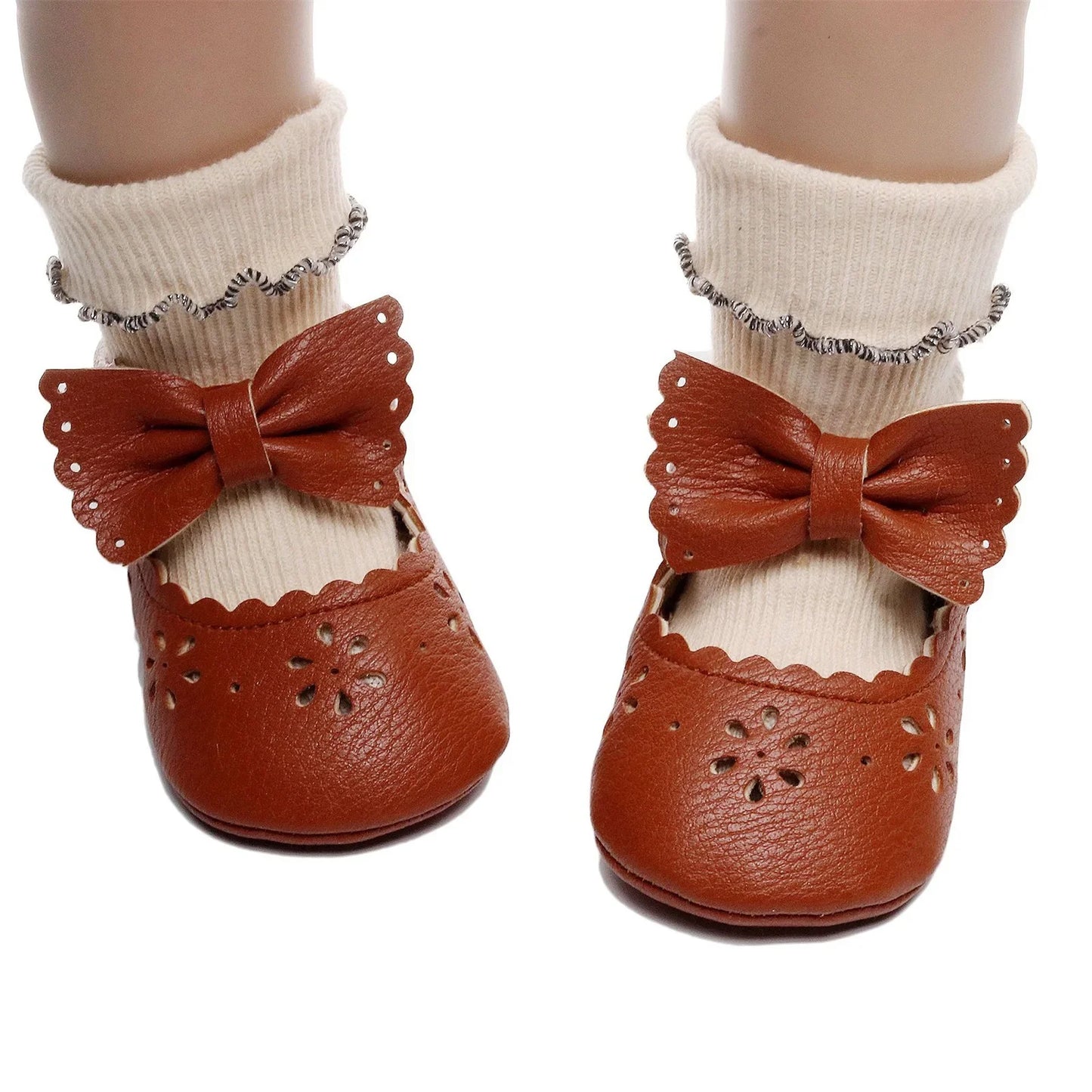 Ökologischer Leder-Schuh mit Schleife.